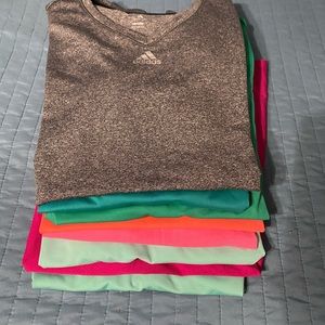 Eight sports shirts.